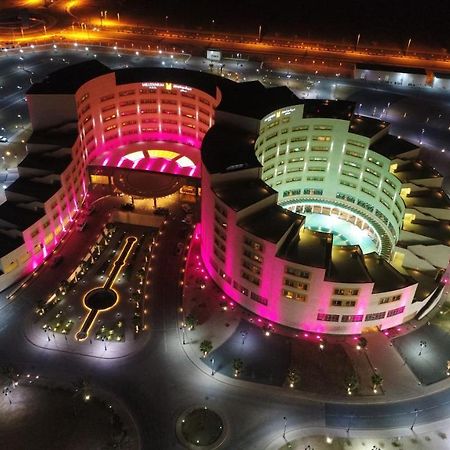 Millennium Hail Hotel מראה חיצוני תמונה Aerial view of the complex